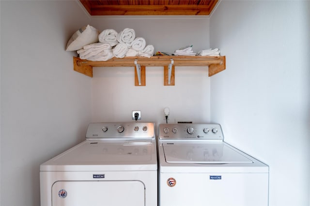 washroom with washer and dryer