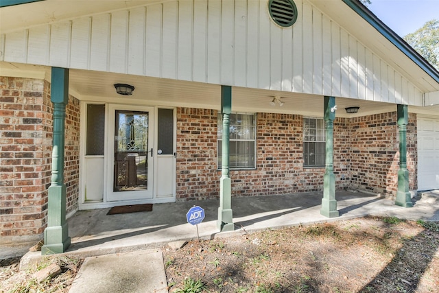 entrance to property with a porch