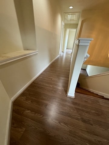 hall with dark hardwood / wood-style floors