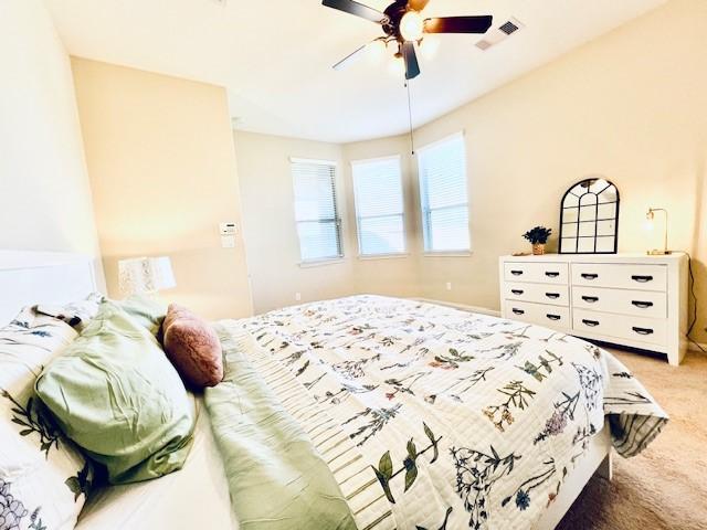 bedroom featuring carpet flooring and ceiling fan