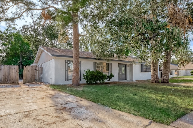 view of front of property with a front lawn