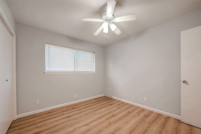 empty room featuring light hardwood / wood-style floors and ceiling fan