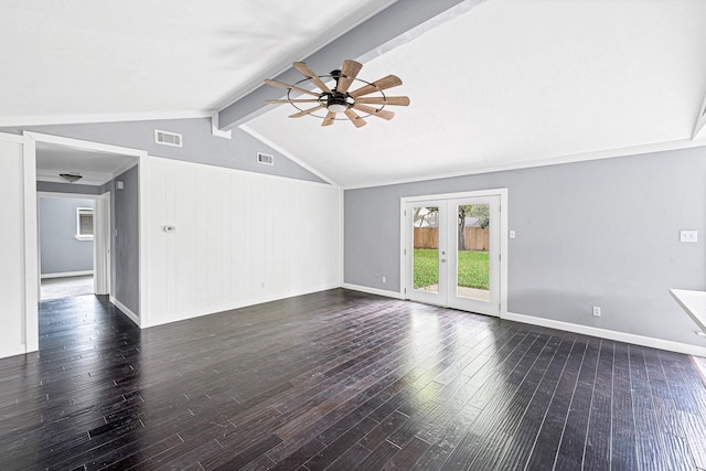 empty room with ceiling fan, dark wood-type flooring, french doors, and vaulted ceiling with beams