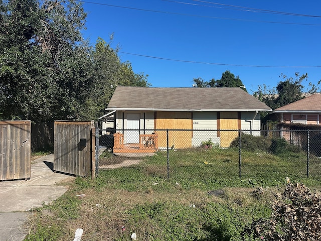 view of outbuilding featuring a lawn