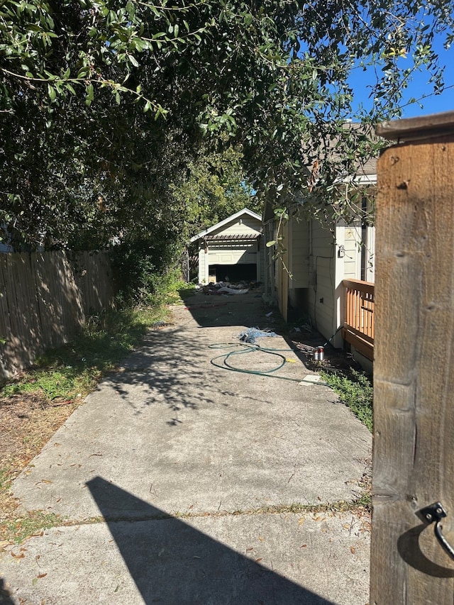 exterior space featuring an outdoor structure and a garage