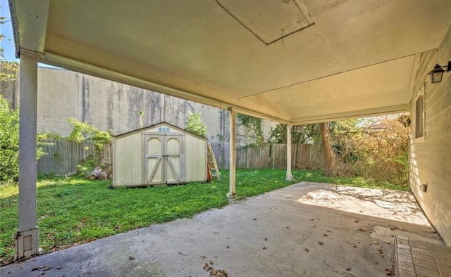 view of patio / terrace featuring a storage shed