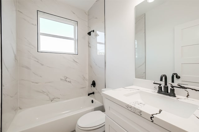 full bathroom with tiled shower / bath combo, toilet, and vanity