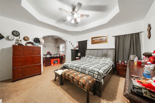 17039 Midships Way, Crosby, TX 77532 - carpeted bedroom featuring a tray ceiling and ceiling fan