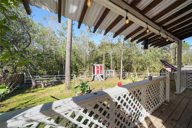 17039 Midships Way, Crosby, TX 77532 - wooden terrace with a lawn and a shed