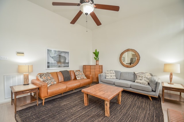 living room featuring hardwood / wood-style flooring and ceiling fan