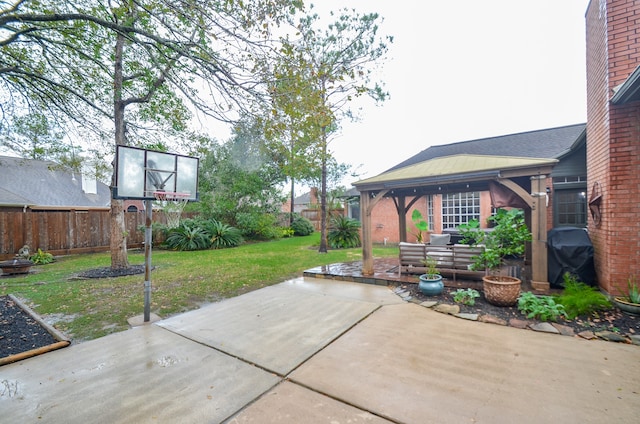 view of patio / terrace featuring a gazebo, grilling area, and an outdoor living space