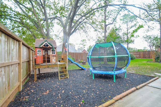 view of playground with a trampoline