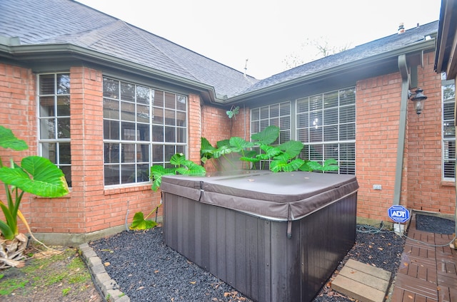 view of patio / terrace featuring a hot tub