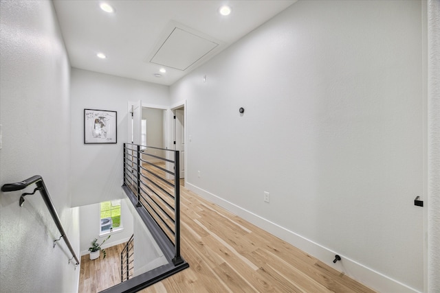 hallway featuring hardwood / wood-style flooring