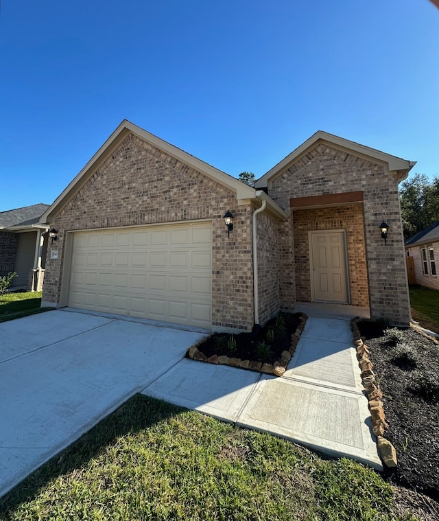 single story home featuring a garage