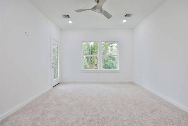 9339 Lavender St, North Houston, TX 77016 - empty room with carpet floors, baseboards, ceiling fan, and recessed lighting