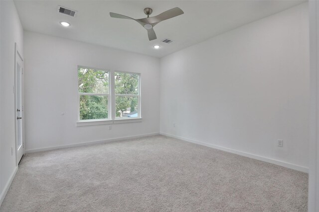 9339 Lavender St, North Houston, TX 77016 - carpeted spare room with ceiling fan and recessed lighting