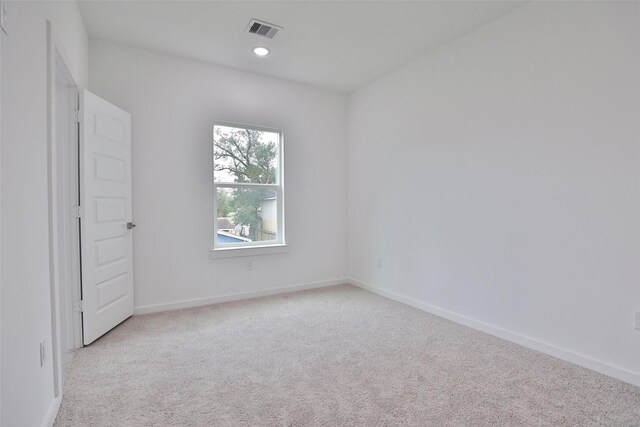 9339 Lavender St, North Houston, TX 77016 - spare room with light colored carpet and baseboards