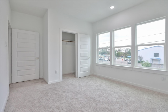 9339 Lavender St, North Houston, TX 77016 - unfurnished bedroom featuring carpet flooring, a closet, and recessed lighting