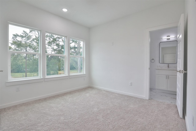 9339 Lavender St, North Houston, TX 77016 - unfurnished room featuring light carpet and recessed lighting