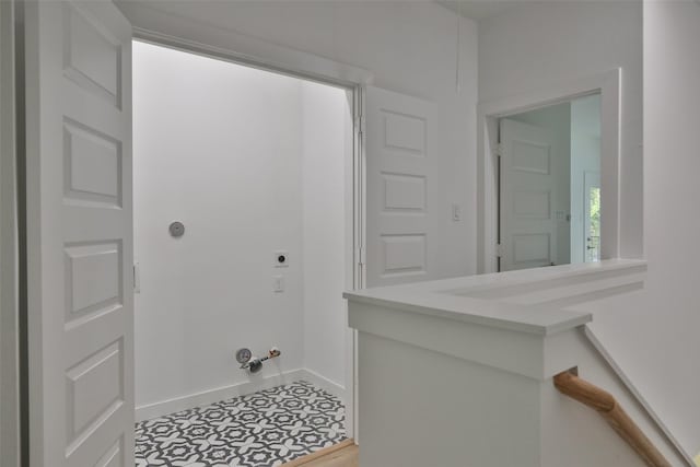 9339 Lavender St, North Houston, TX 77016 - laundry area featuring electric dryer hookup, hookup for a gas dryer, and tile patterned floors