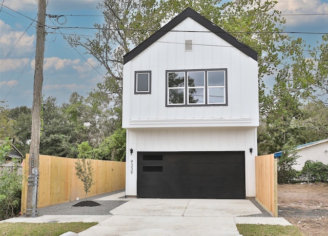 9339 Lavender St, North Houston, TX 77016 - view of front of home with an attached garage and driveway