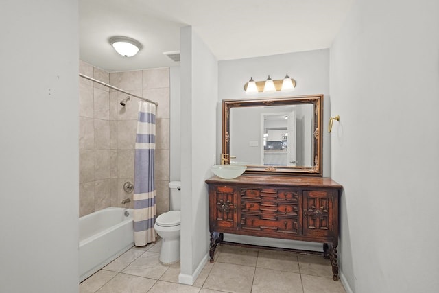 full bathroom with tile patterned floors, vanity, toilet, and shower / tub combo