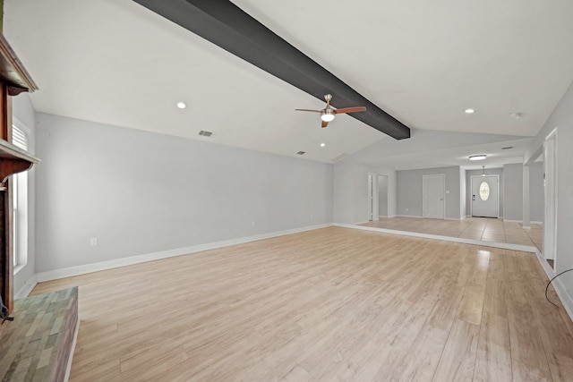 unfurnished living room with lofted ceiling with beams, light hardwood / wood-style floors, and ceiling fan