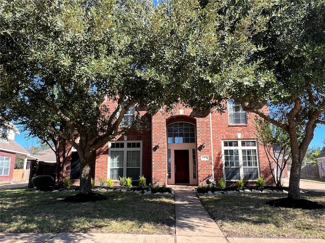 view of front of home with a front lawn