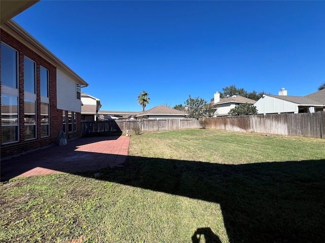 view of yard with a patio area