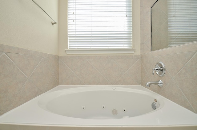 bathroom featuring a tub to relax in