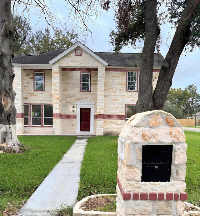 view of front of home with a front yard