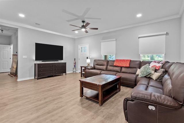 living room with ceiling fan, light hardwood / wood-style floors, and crown molding