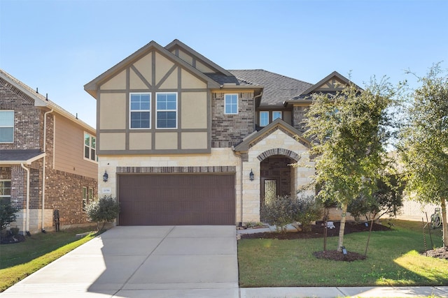 tudor house with a garage and a front yard