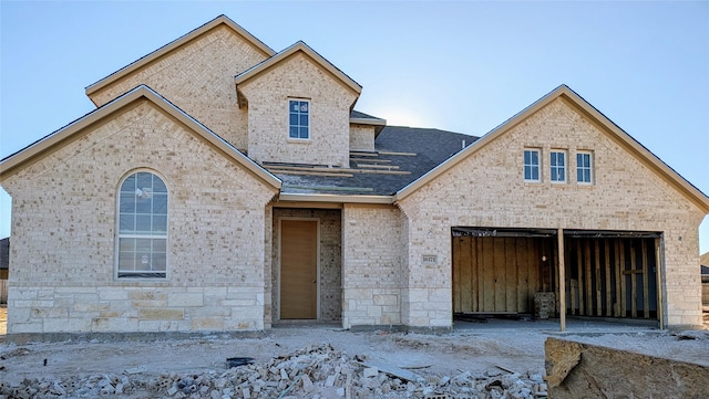 property in mid-construction with a garage