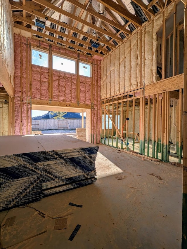 miscellaneous room featuring a high ceiling