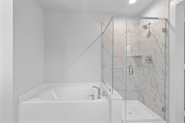 6703 Old Cypress Landing Ln, Humble, TX 77338 - bathroom featuring recessed lighting, a bath, and a stall shower