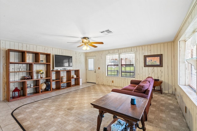 living room featuring ceiling fan