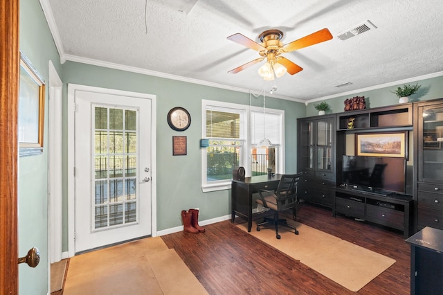 home office featuring hardwood / wood-style floors, ceiling fan, ornamental molding, and a textured ceiling