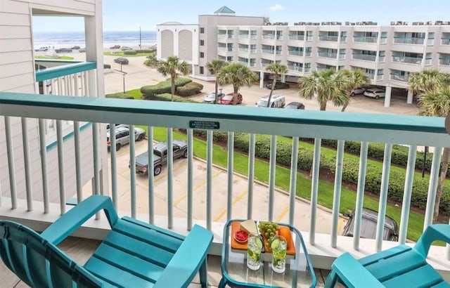 6102 Seawall Blvd Unit 318, Galveston, TX 77551 - balcony featuring a water view