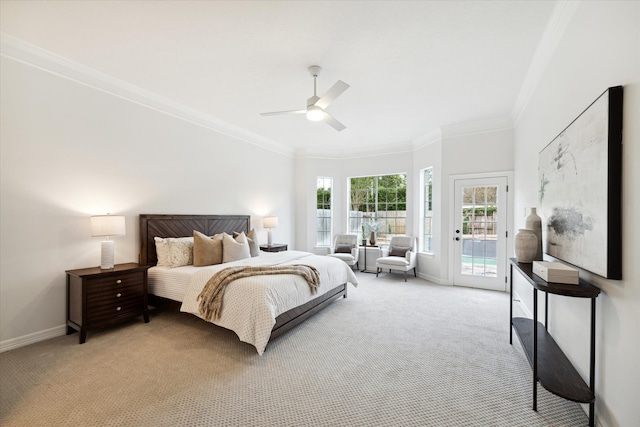 carpeted bedroom featuring access to outside, ceiling fan, and ornamental molding