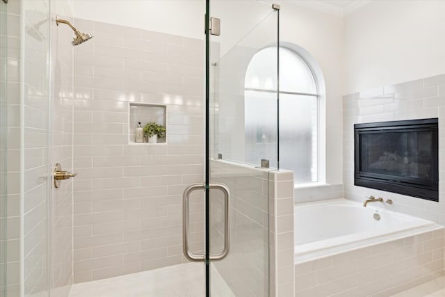 bathroom with shower with separate bathtub