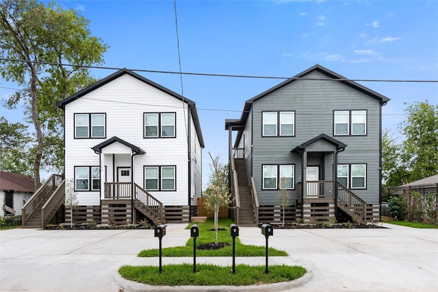 1319 E 35th St, Houston, TX 77022 - view of front of home featuring driveway and stairs
