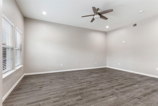 1319 E 35th St, Houston, TX 77022 - unfurnished room with plenty of natural light, a ceiling fan, dark wood-type flooring, and recessed lighting