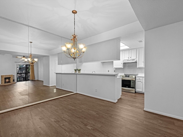 kitchen with white cabinetry, stainless steel range with electric cooktop, and dark wood-type flooring