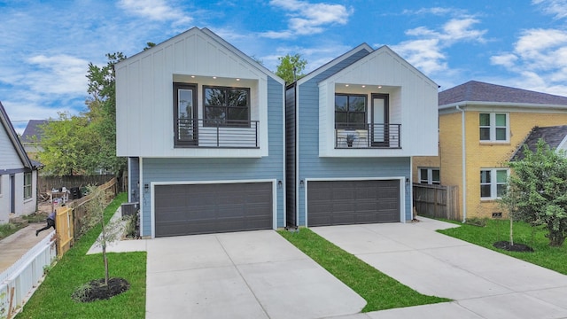 view of front of house with a garage and a balcony