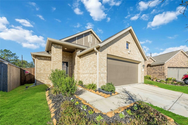 view of front of property with a garage and a front lawn