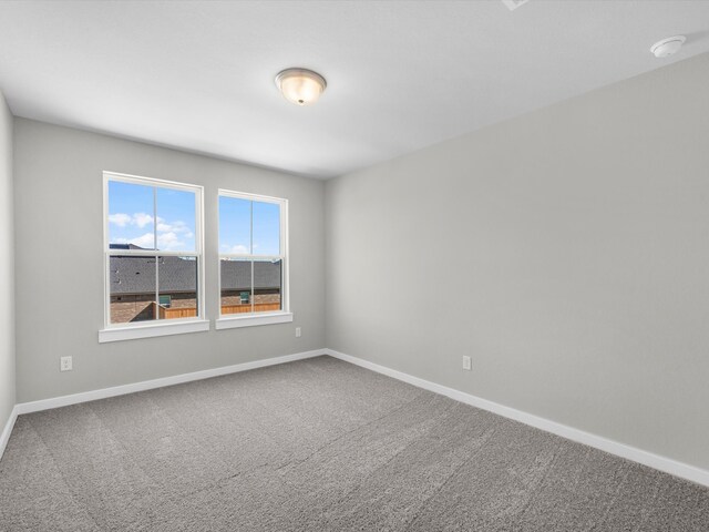 spare room with carpet flooring