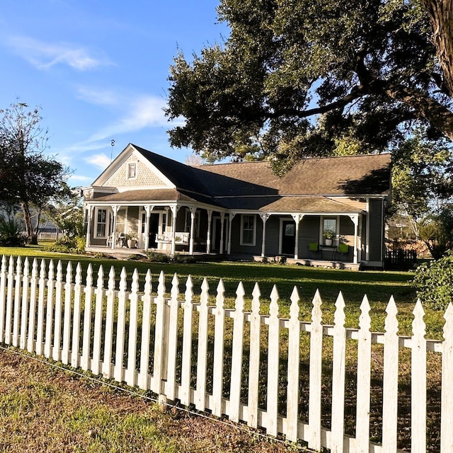 single story home with a front lawn and a porch