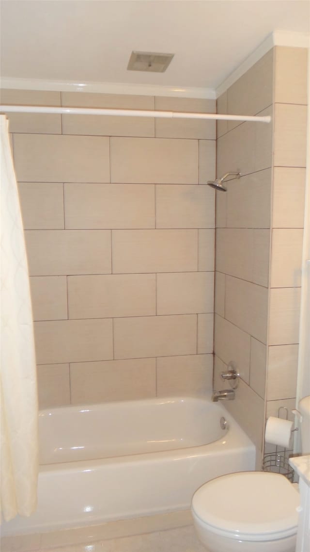 full bathroom with vanity, toilet, and shower / tub combo with curtain